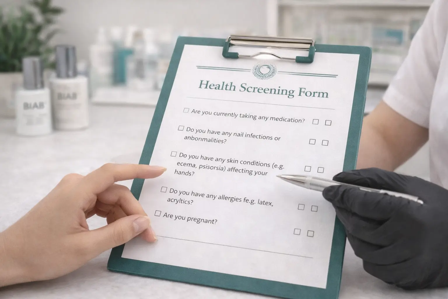 Professional nail consultation form on clipboard showing client health screening and GDPR compliance for UK salons