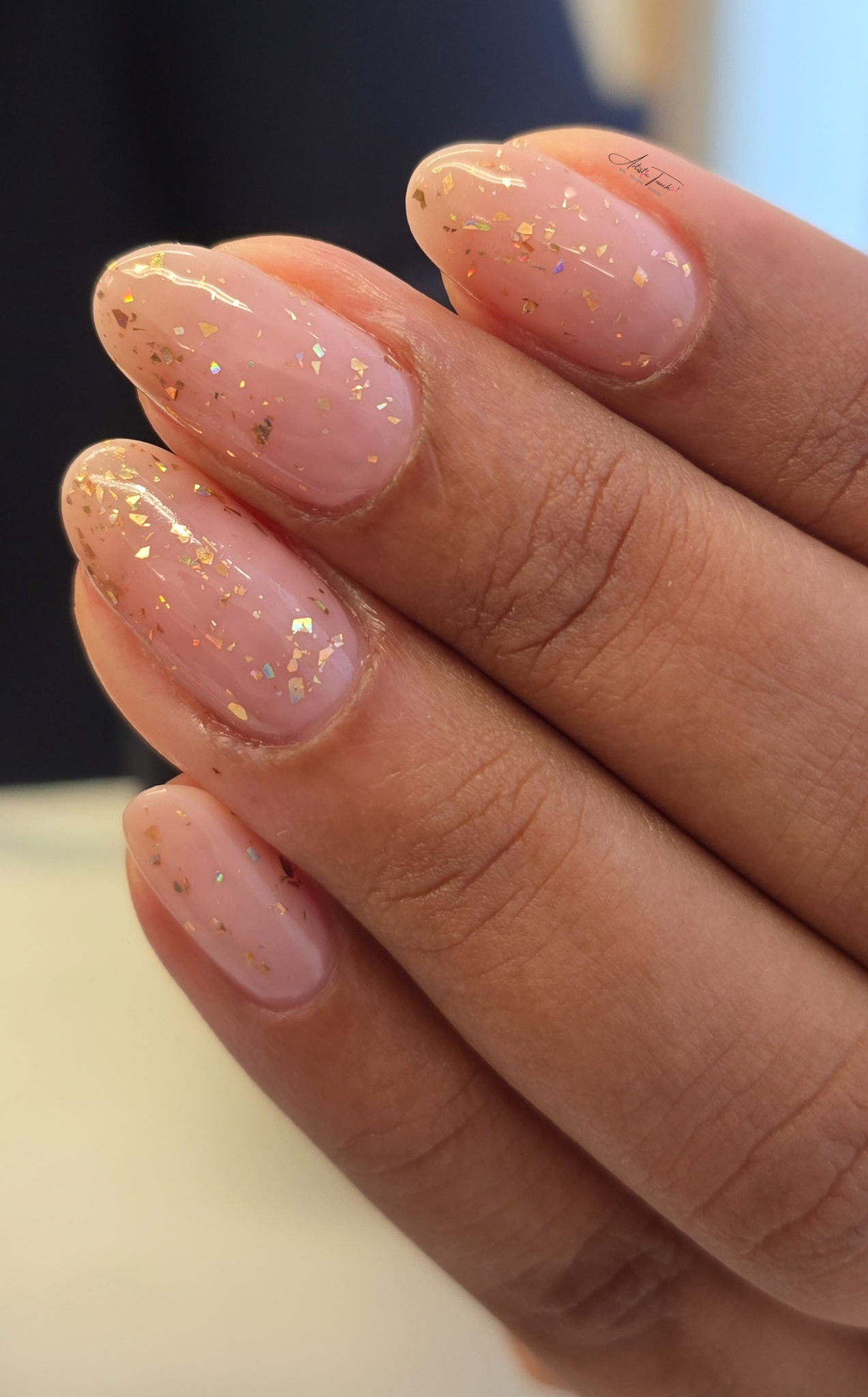 Natural nude manicure with subtle gold flakes created by Radina Ignatova
